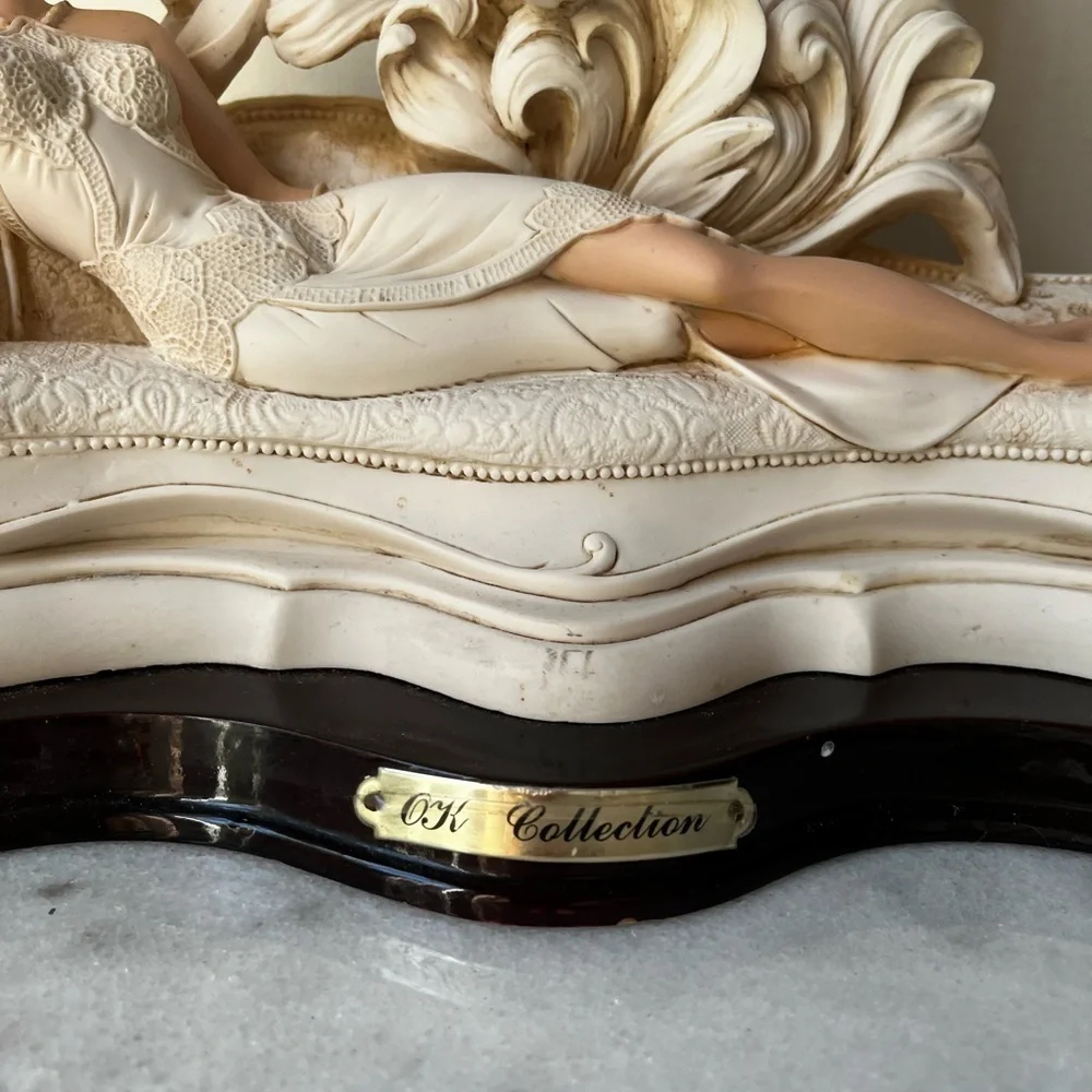Elegant Cream Clock with Reclining Lady Figurine